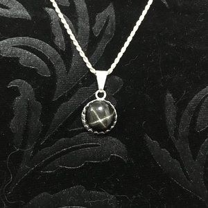 Black star pendant